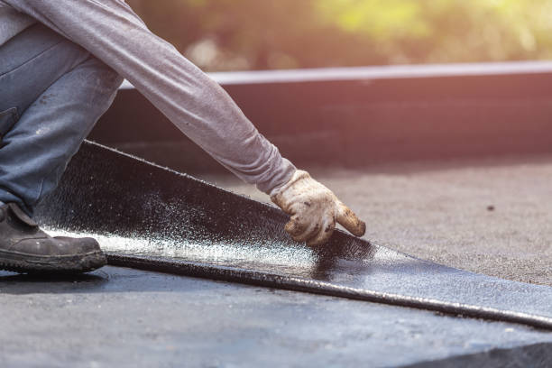 Professional Emergency Waterproofing technician working in Johnson City, NY